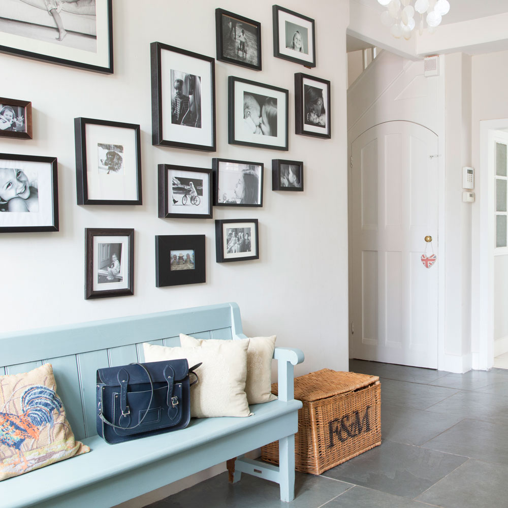 White hallway with picture gallery wall